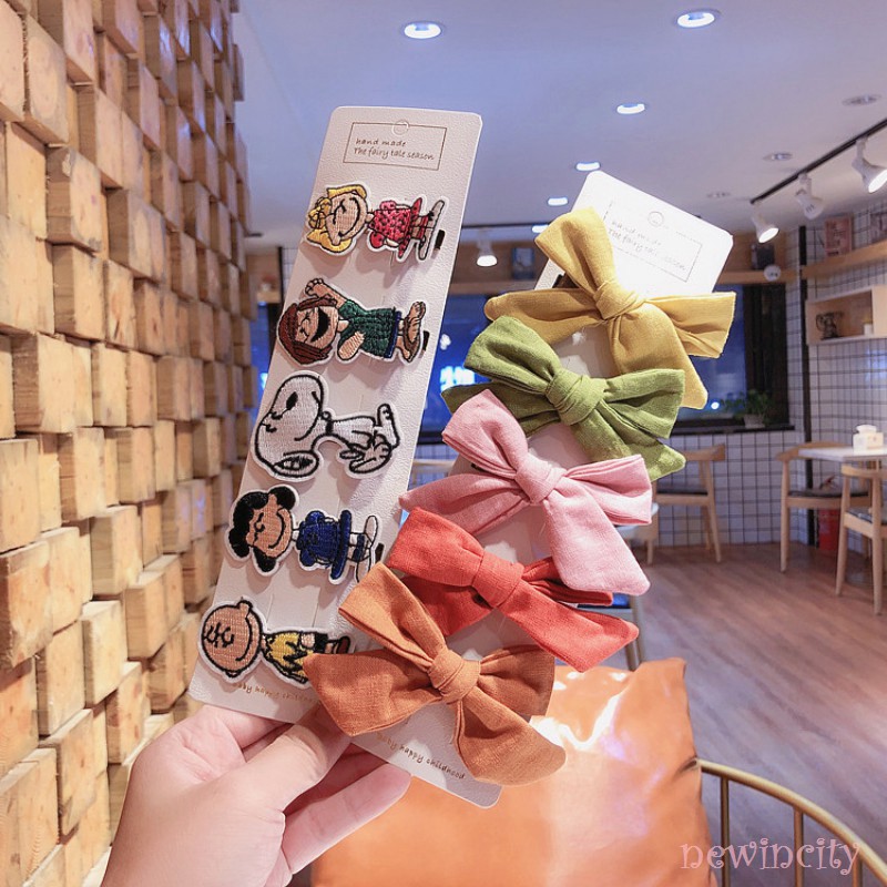 Set 2 kẹp tóc hình nơ và nhân vật hoạt hình dễ thương thời trang cho bé gái