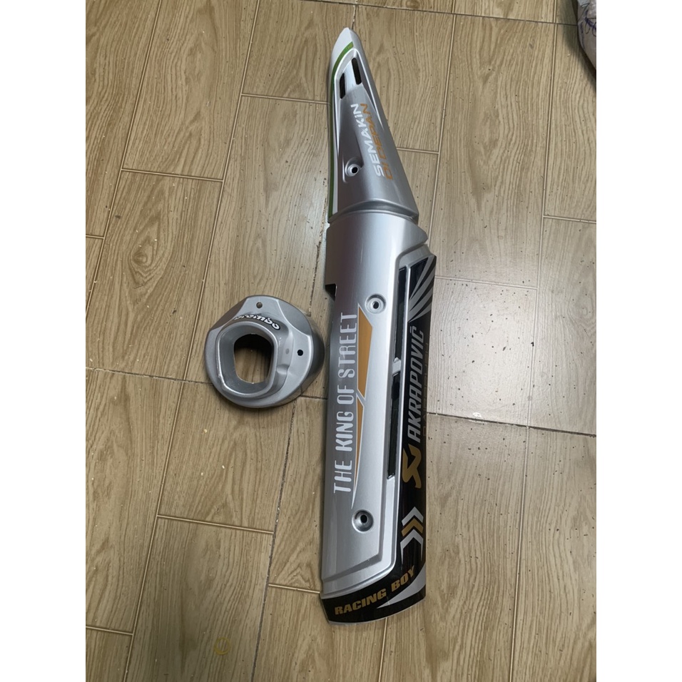 Ốp pô và chụp đích pô xe exciter 150 mẫu mới màu bạc