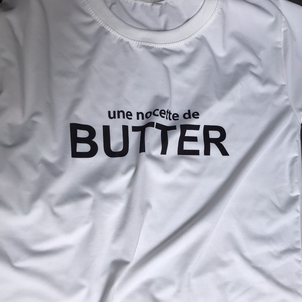 Áo phông nữ trắng cổ tròn, áo phông tay ngắn chất mịn đẹp cá tính in BUTTER mã NXC01