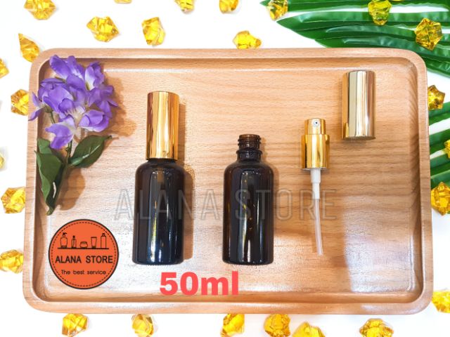 Lọ thủy tinh nâu vòi bơm nhôm vàng 50ml