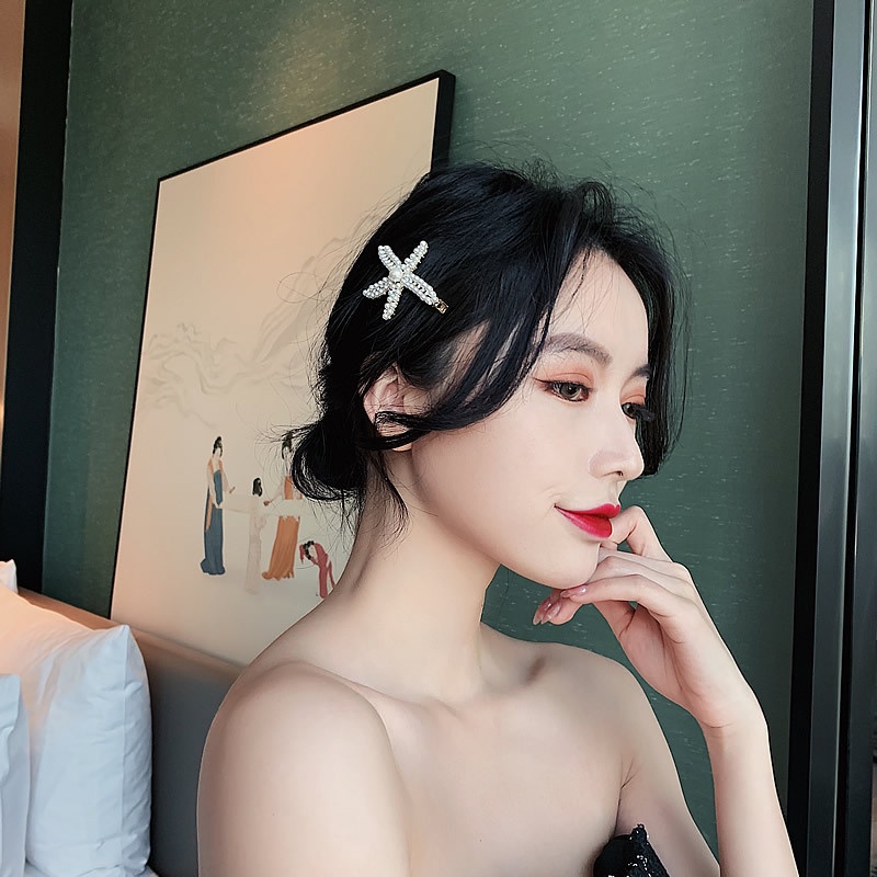 Kẹp tóc hình sao biển đính ngọc trai giả thời trang cho nữ