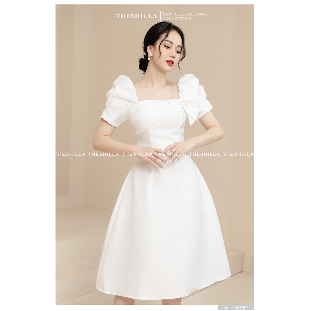 Váy thiết kế cao cấp màu trắng tay phồng xoắn nơ ngực form dài sang trọng  The Shilla - K07-54C0