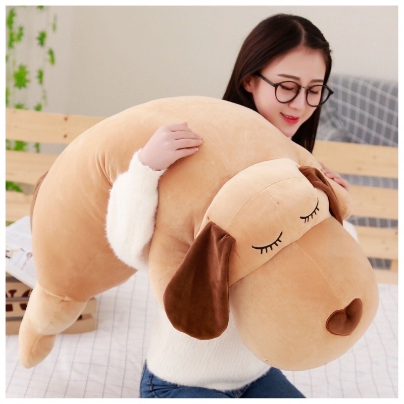 Gấu ôm chó nằm tại dài size 1m2 hàng bông gòn đẹp