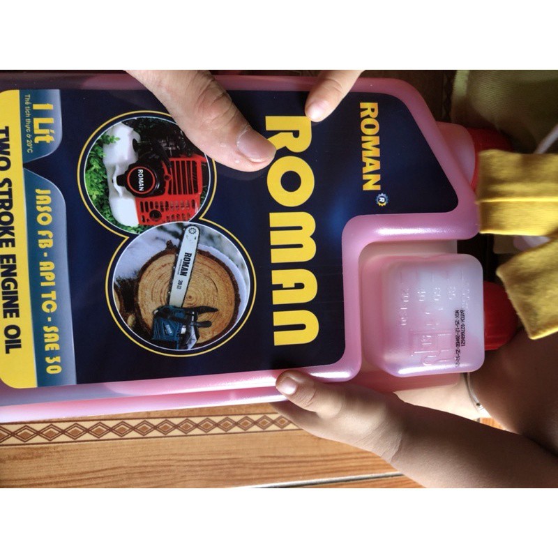 Nhớt pha xăng cho động cơ 2 thì ROMAN cho máy cưa xích, cắt cỏ .