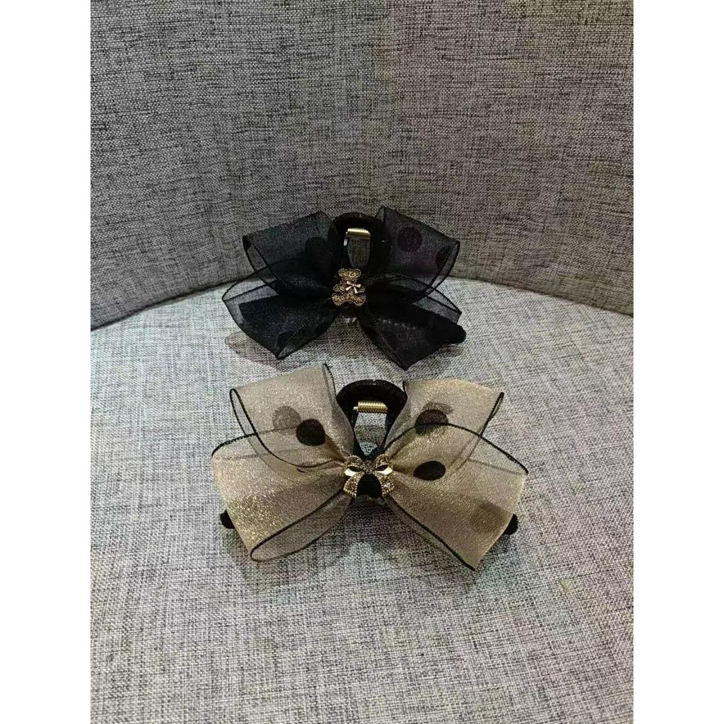 Kẹp càng cua nơ voan chấm bi gắn charm