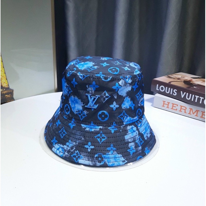 Nón vành Lv nền vải thô loang logo chữ xanh form đẹp tagmac