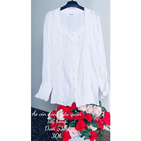 Áo sơ mi trắng dáng dấu quần