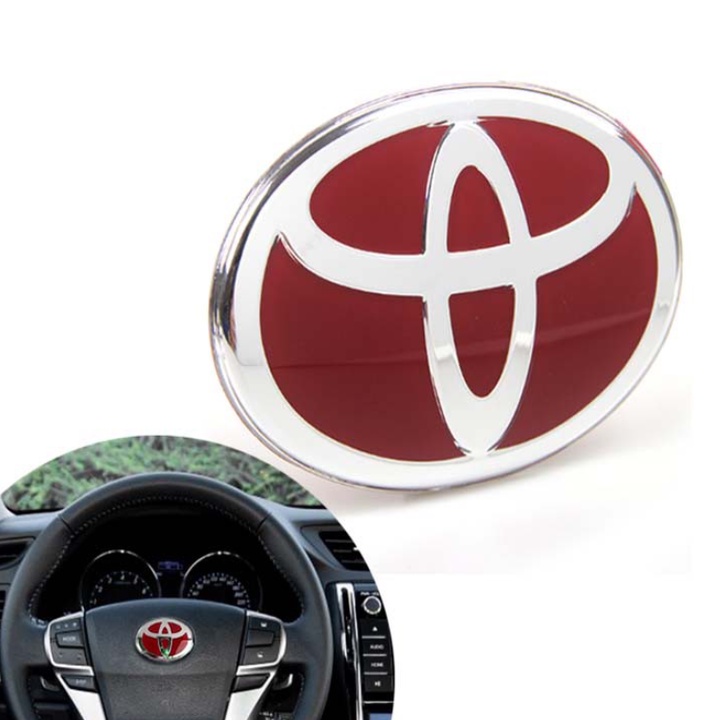 Logo biểu tượng vô lăng xe ô tô Toyota. Kích thước 68x48mm - Có 3 màu: Đen, Đỏ, Xanh