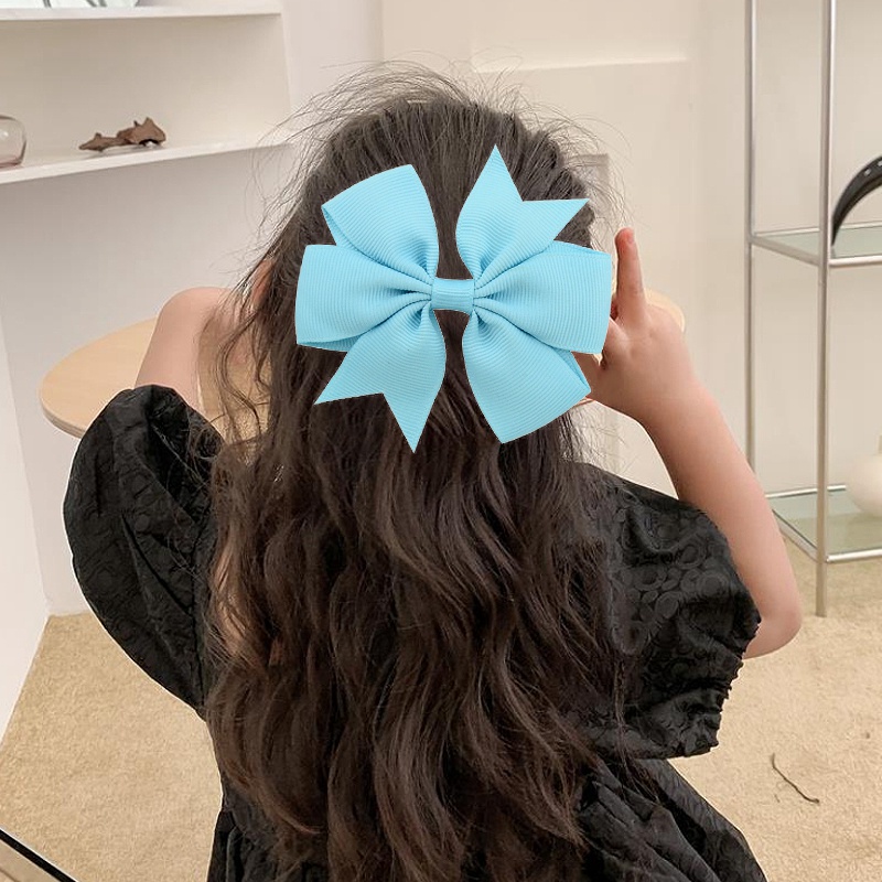 Kẹp tóc nơ bướm thời trang đáng yêu dành cho bé gái