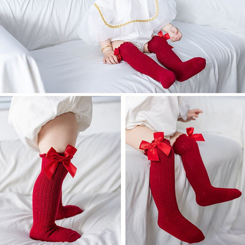 Vớ Cotton Mềm Cao Đến Đầu Gối Chống Trượt Màu Trơn Đính Nơ Thời Trang Thu Đông Cho Bé Sơ Sinh
