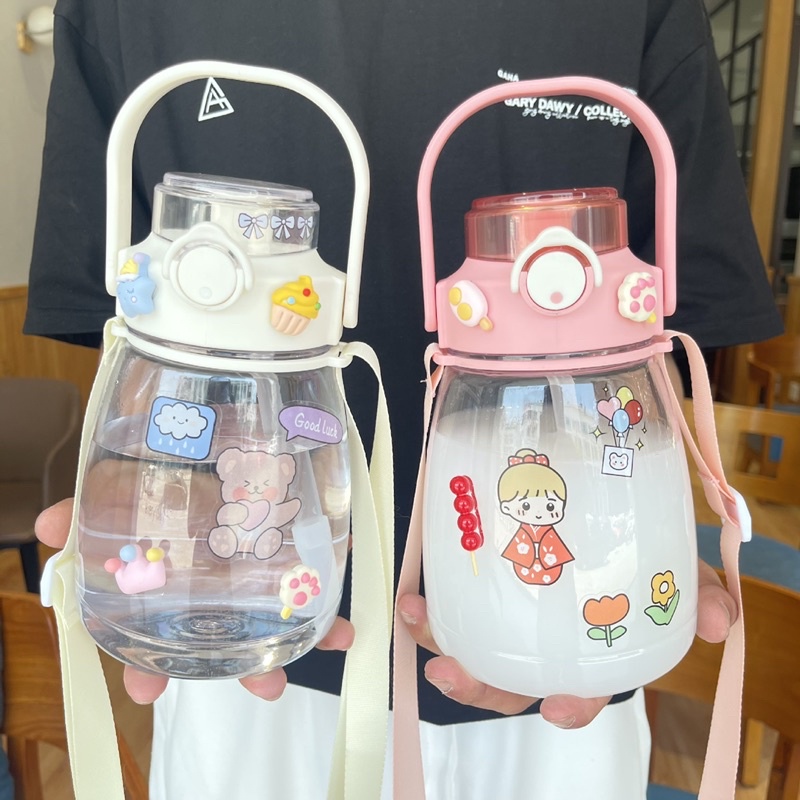 Bình đựng nước 1L-1.3L có ống hút chia vạch nhắc uống nước màu dễ thương, cute, bình nước trong suốt.