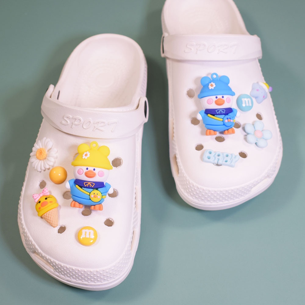 Set 10 Phụ Kiện Gắn Ba Lô / Giày Crocs / Túi Xách Hình Vịt Hoạt Hình Dễ Thương Cho Bé