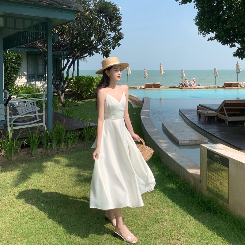 Đầm nữ hai dây dáng suông midi hở lưng cột nơ sau