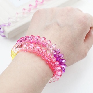 Cột tóc lò xo ombre