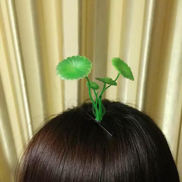 Kẹp mái tóc mầm cây trên đầu cute