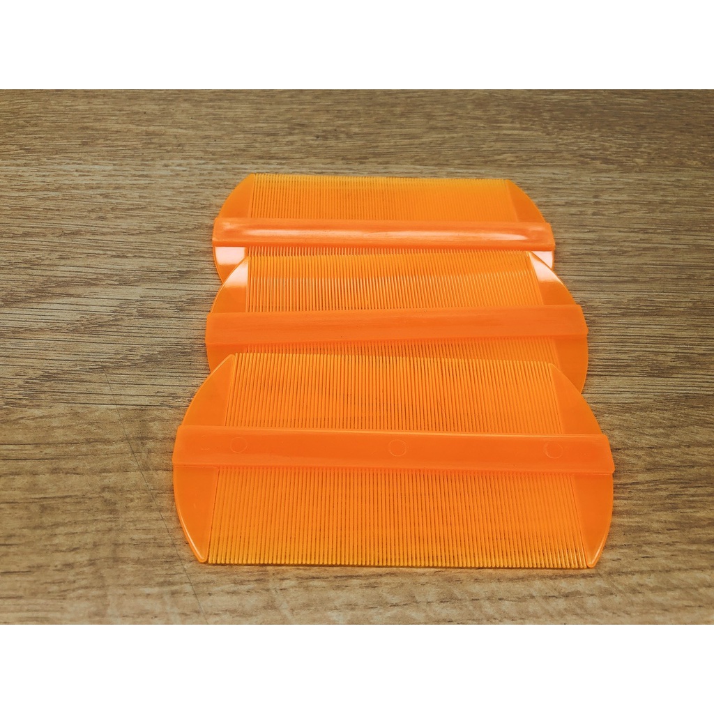 lược chải chí màu cam loại nhỏ ( 1 hộp meka 12 cấy )