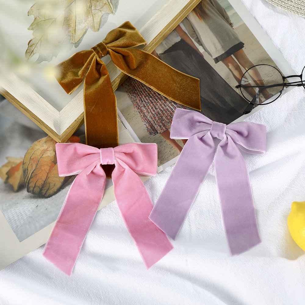 Kẹp tóc Haimeikang gắn nơ đính ngọc trai bằng