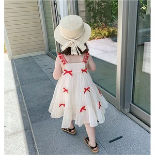 Váy 2 dây đính nơ đỏ siêu xinh