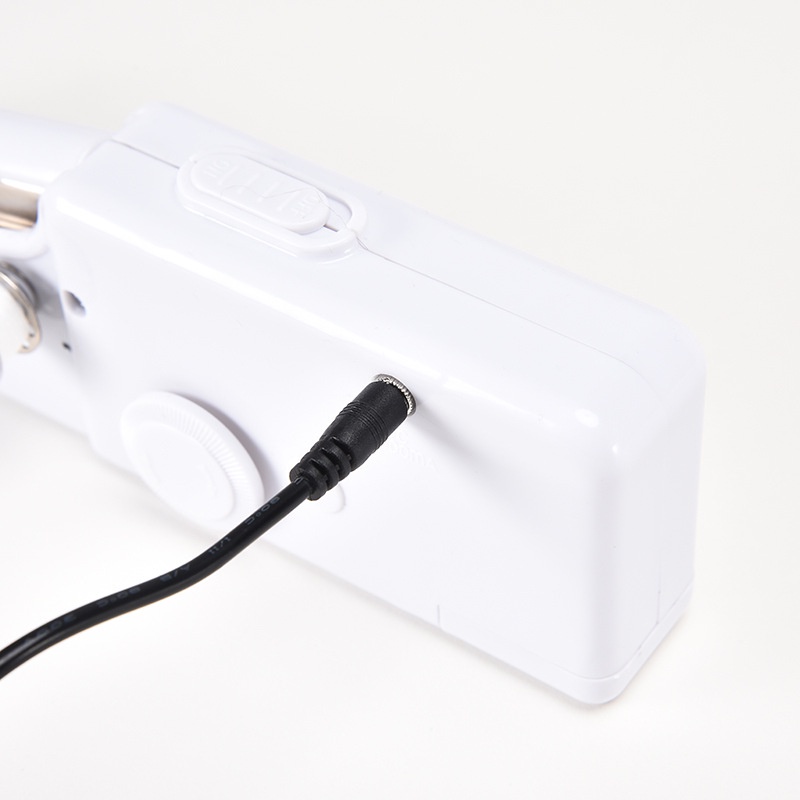 Máy may mini cầm tay HANDY STITCH  chạy pin đa năng tiện dụng cho gia đình