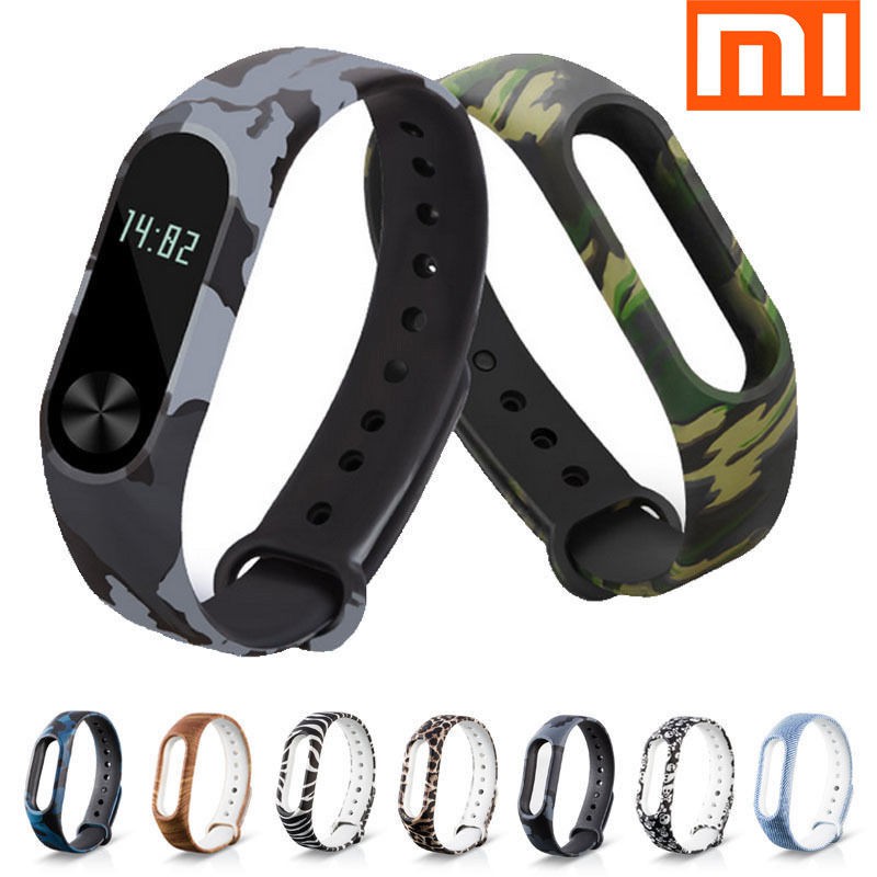 Dây Đeo Thay Thế Chất Liệu Silicon Thiết Kế Nhiều Lỗ Thời Trang Cho Xiaomi Mi Band2