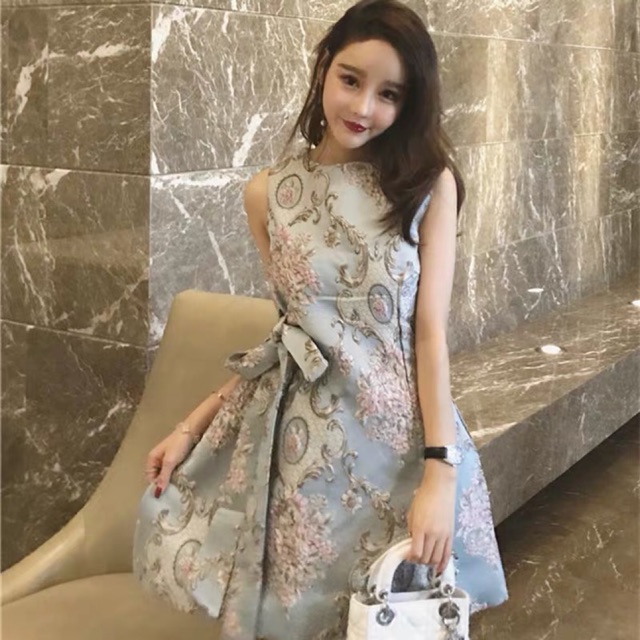 Đầm xoè họa tiết cột nơ eo