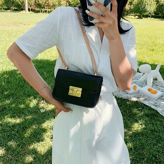 Túi nữ khoá miu da rắn