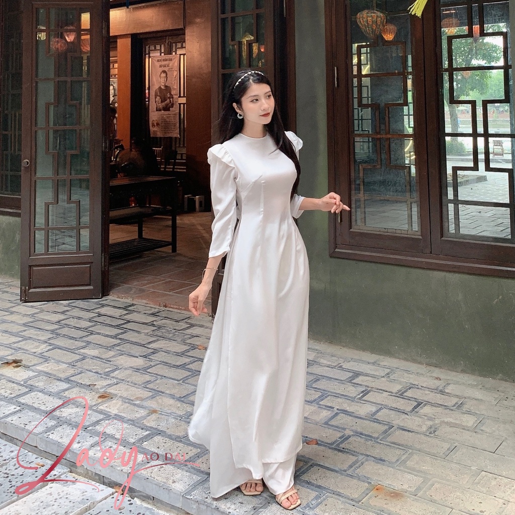 Áo dài học sinh Áo dài trắng cổ tròn tay bồng cột nơ sau phong cách tiểu thư, vải Organza xốp hoa co giãn nhẹ LD005