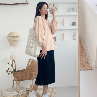 Chân váy midi cotton đen xẻ tà sau
