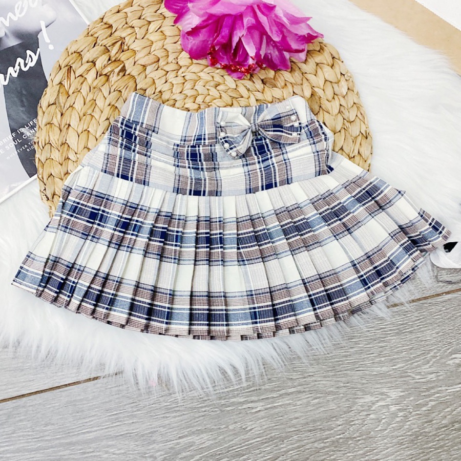 Váy xếp ly phối nơ diệu đà cho bé gái diện lễ đi chơi đi học