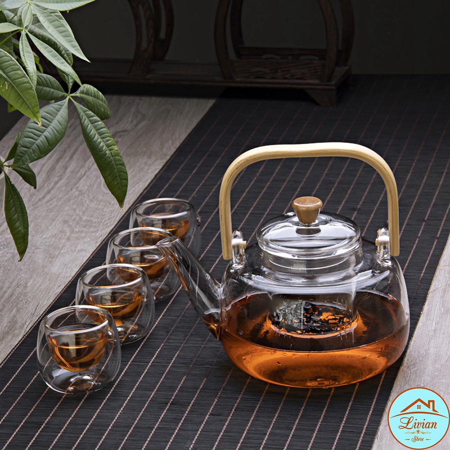 Ấm trà thủy tinh, bình trà thủy tinh có lõi lọc quai cầm bằng tre dung tích 900ml chịu nhiệt cực tốt