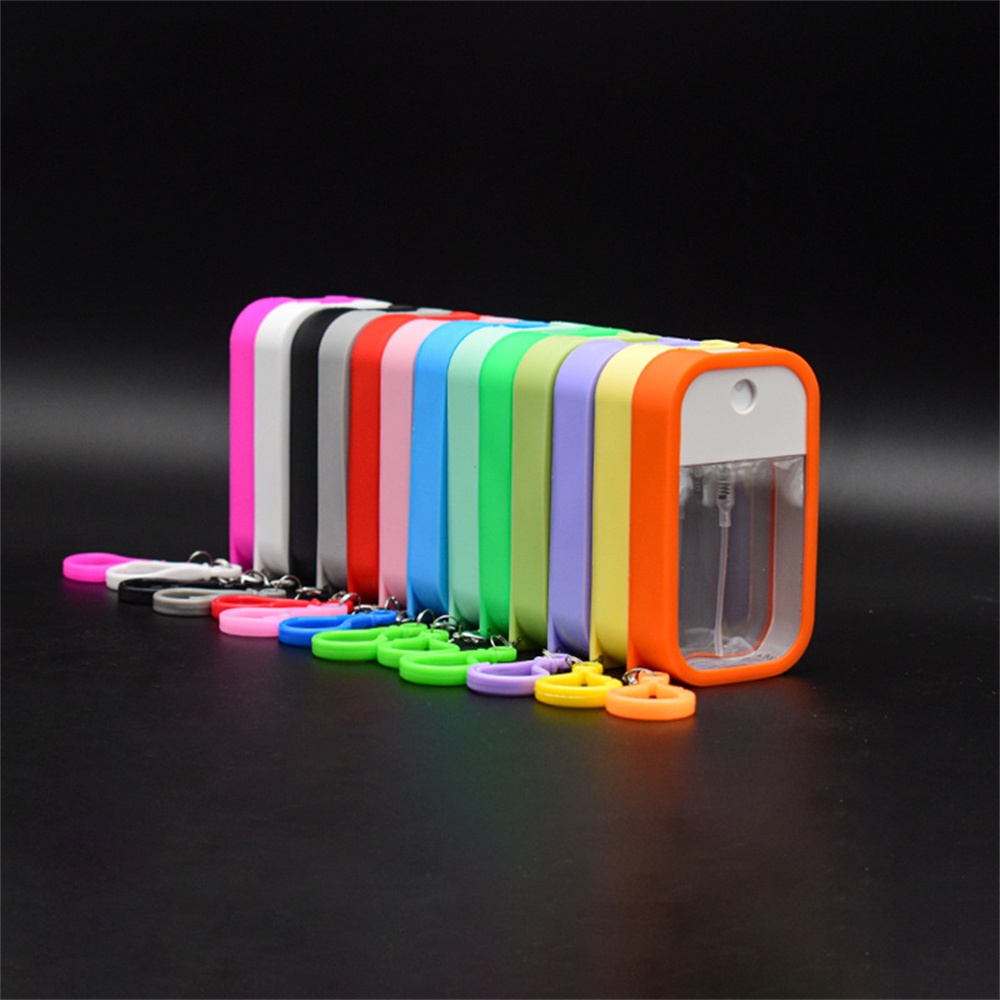 Chai cồn rỗng hình vuông kèm móc khóa và vỏ bằng silicone có thể tái sử dụng
