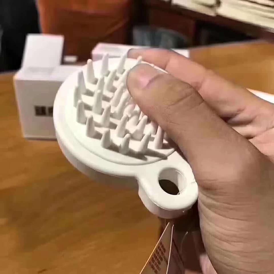 Lược mat xa đầu màu trắng
