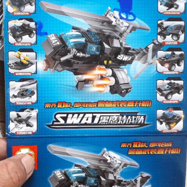 Lắp ráp 1 hộp LegoSWat xe máy bay 1020 có nhiều chi tiết bằng nhựa ABS