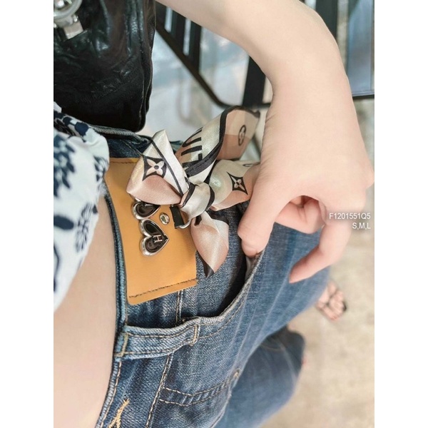 Quần jeans ống loe nơ vải