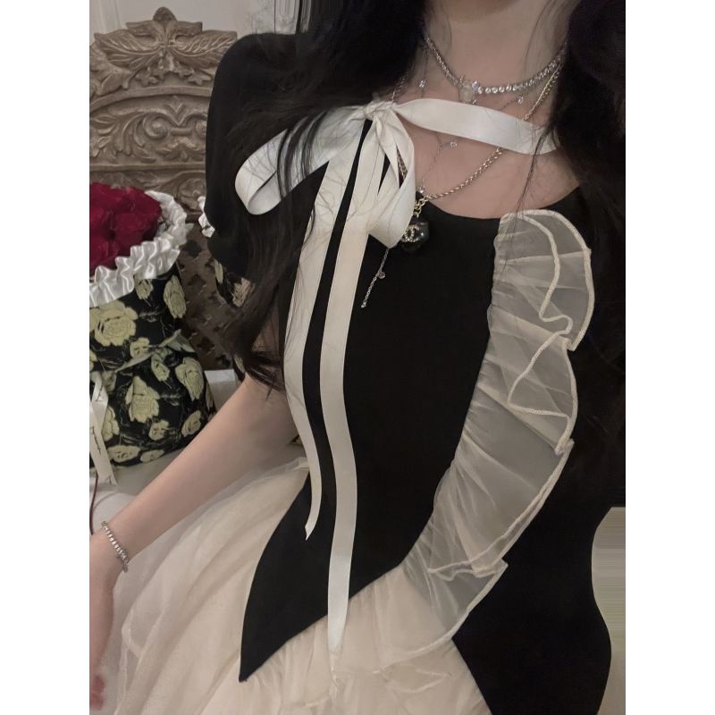 French low-key daughter designer in summer, young lady's temperament shows thin coat, dream high-waist gauze dress, two sets of women.