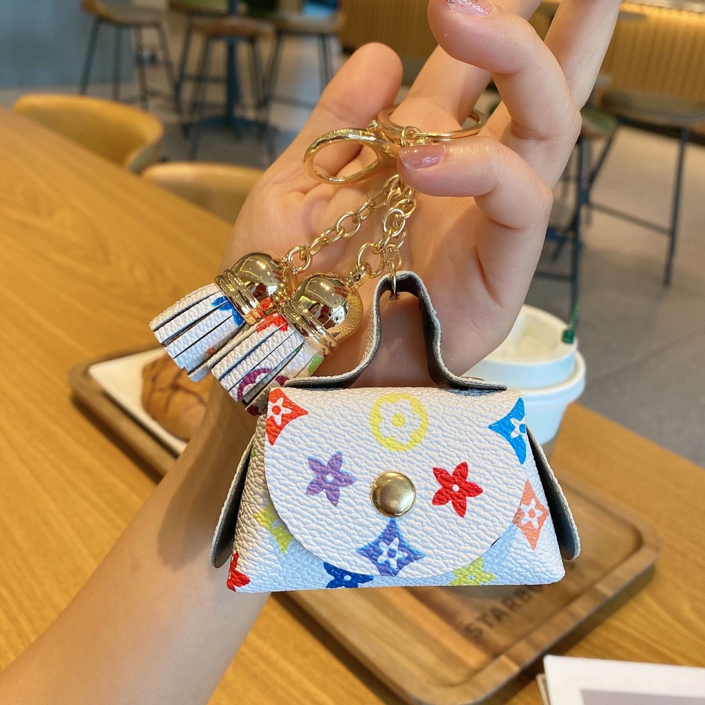 Túi Đựng Tai Nghe Bluetooth/Chìa Khóa/Tiền Xu Mini Phối Tua Rua Dễ Thương