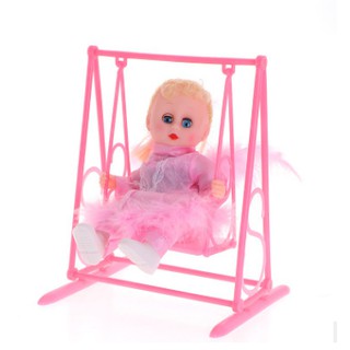 Búp bê ngồi xích đu đọc sách có nhạc