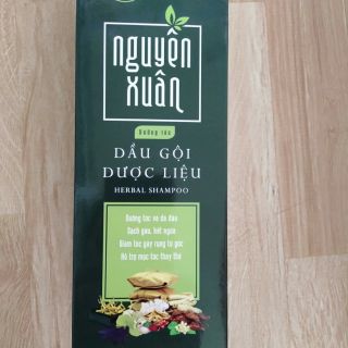 Dầu gội Nguyên Xuân xanh chai to