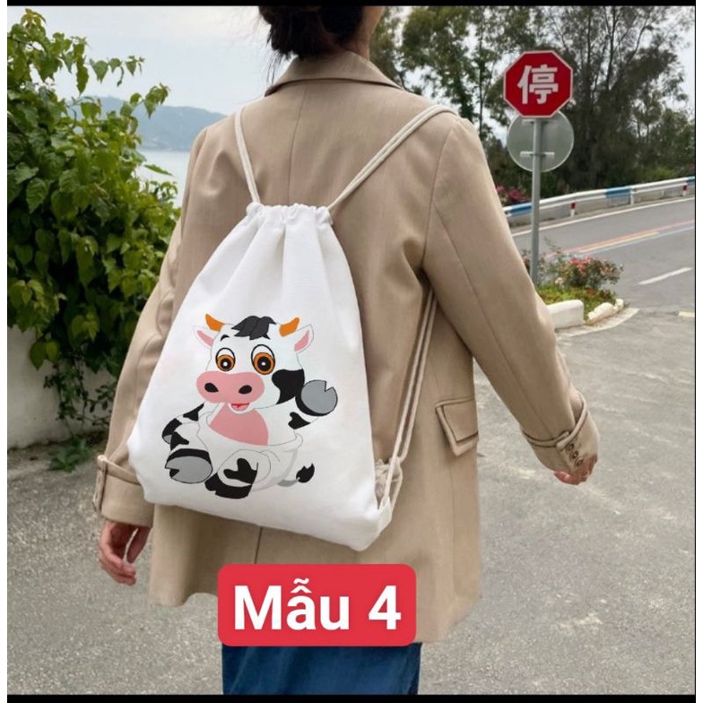 ba lô dây rút các mẫu bò sữa kích thước 50×37 chất vải dày đựng sách vở tài liệu siêu cu te