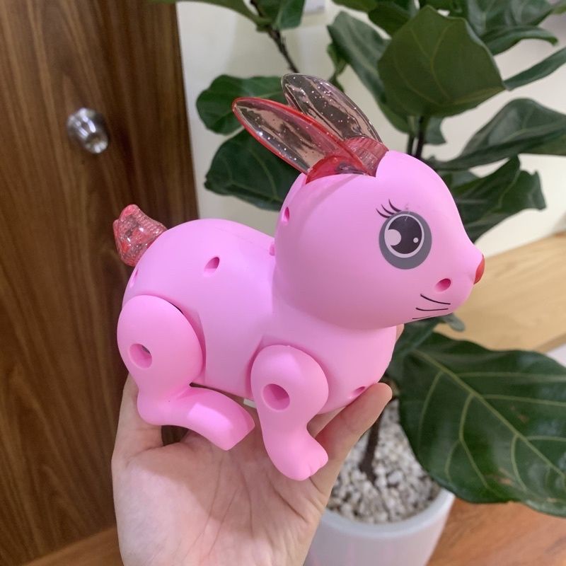 Đồ chơi chú thỏ chạy pin phát nhạc có đèn đáng yêu cho bé