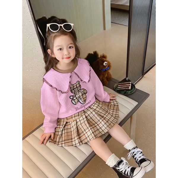 Bộ áo xốp gấu chân váy kẻ bé gái