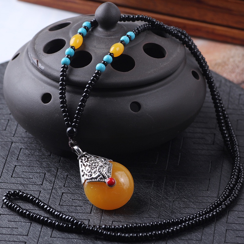 Boutique ethnic style long beaded sweater chain imitation beeswax pendant jewelry necklace temple fair
