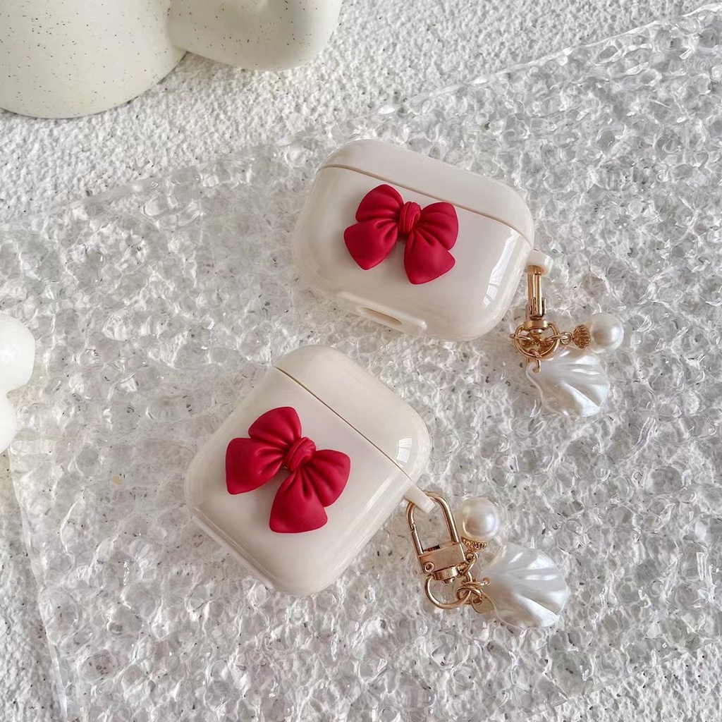 Vỏ Bảo Vệ Hộp Sạc Tai Nghe Bluetooth Apple Airpods 1 / 2 Pro Bằng Tpu Chống Thất Lạc Hình Nơ Màu Trắng