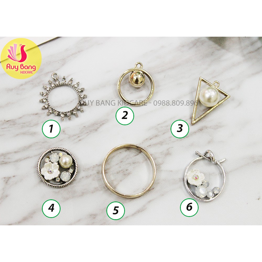 Cành lá kim loại, center đá đính hoa vải handmade