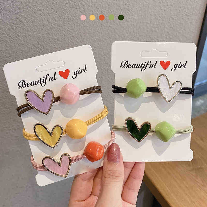 Cột tóc trái tim kèm lục giác màu sắc dây đôi chắc chắn CT132