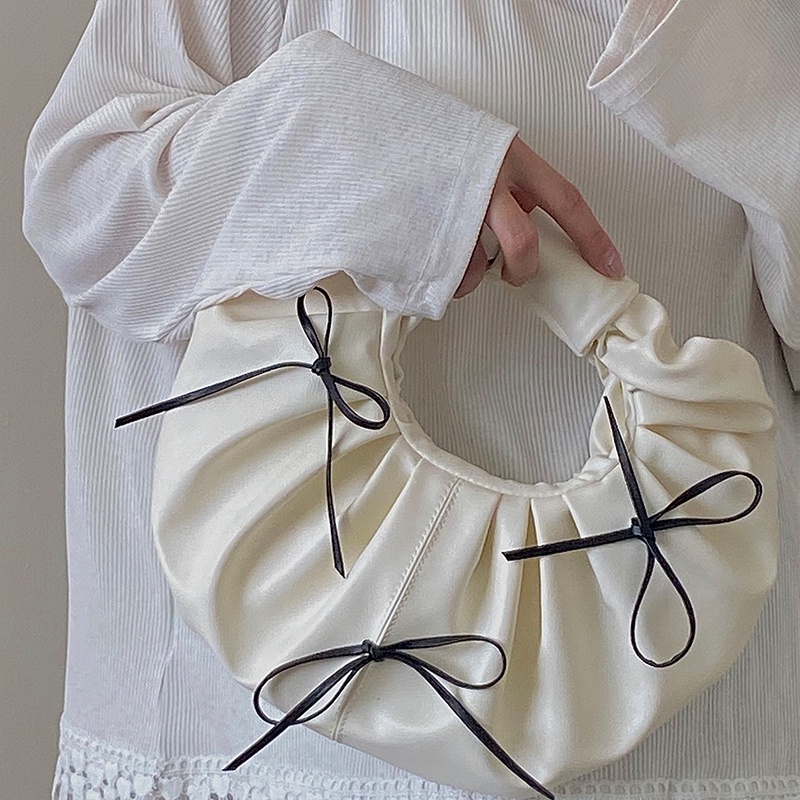 Túi xách tròn nhỏ đính nơ thời trang cho nữ