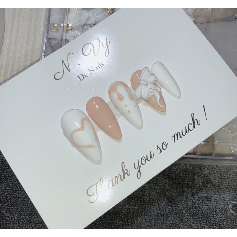 Nail box nơ trắng cam