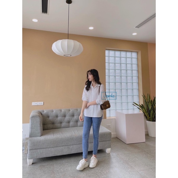 Áo sơ mi trắng xẻ tà