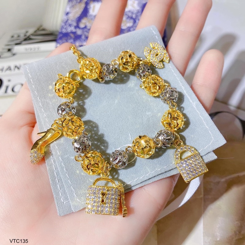 Lắc bi đồng tiền charm