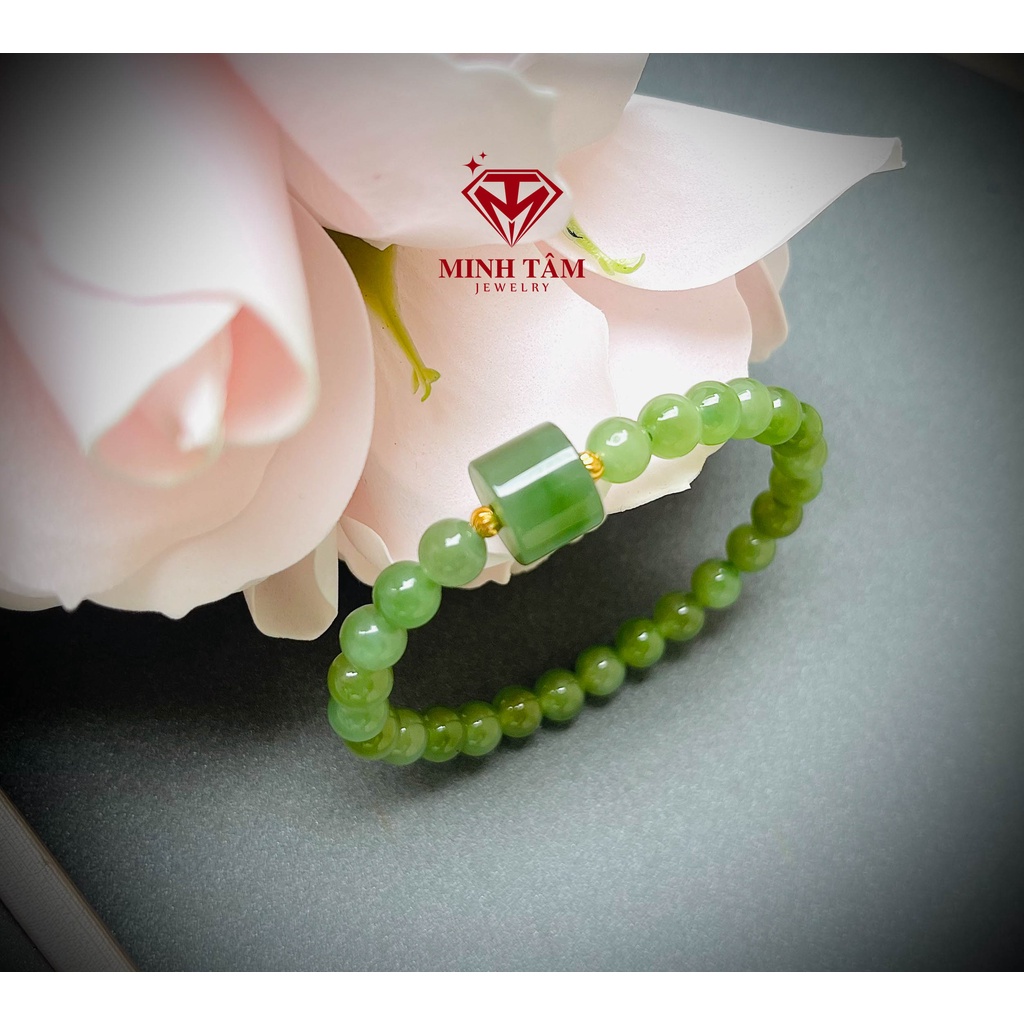 Vòng tay Ngọc Hòa Điền 6 ly mix charm sen, cỏ bốn lá, lu thống ngọc xanh lá bi Au 10k-Minh Tâm Jewelry